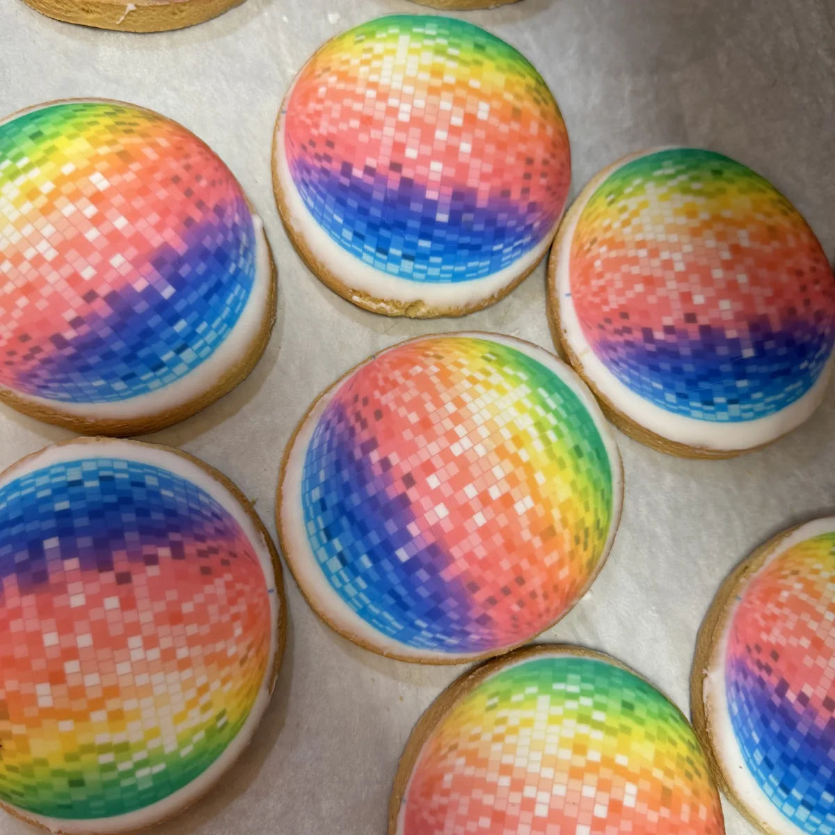 Colorful rainbow designs printed on custom Cookies for Cause cookies