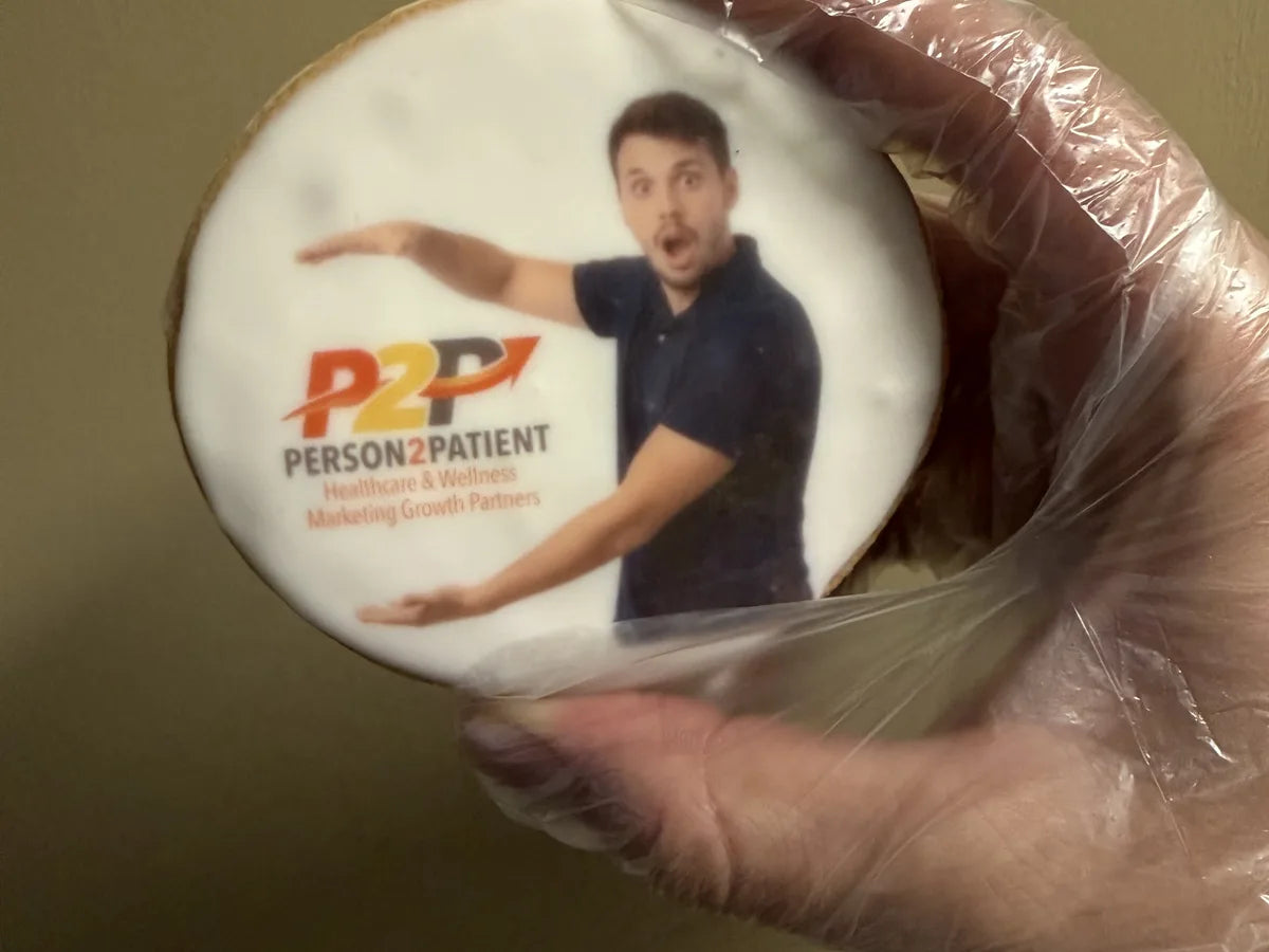 An organization spokesperson and logo printed together on a custom cookie